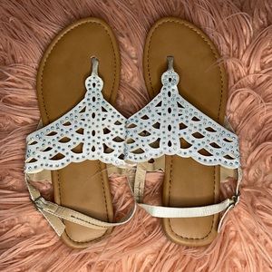 White sandals white little pebbles, size 8.